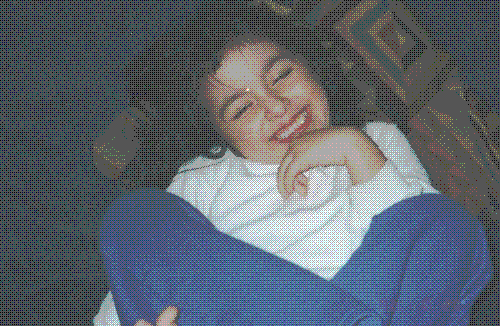 a photo a kid smiling